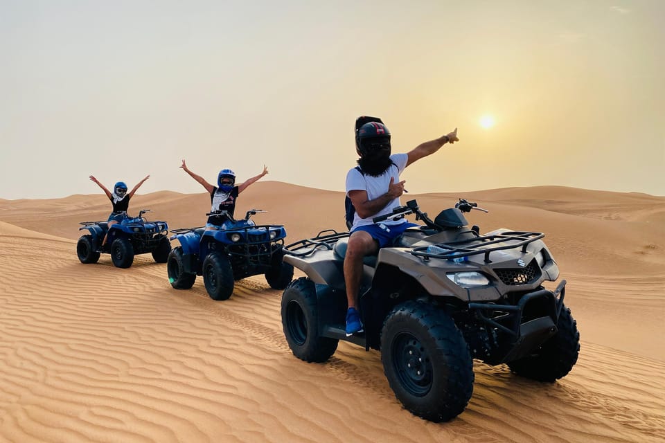 Evening Red sand Quad Bike Desert Safari Travels Tours